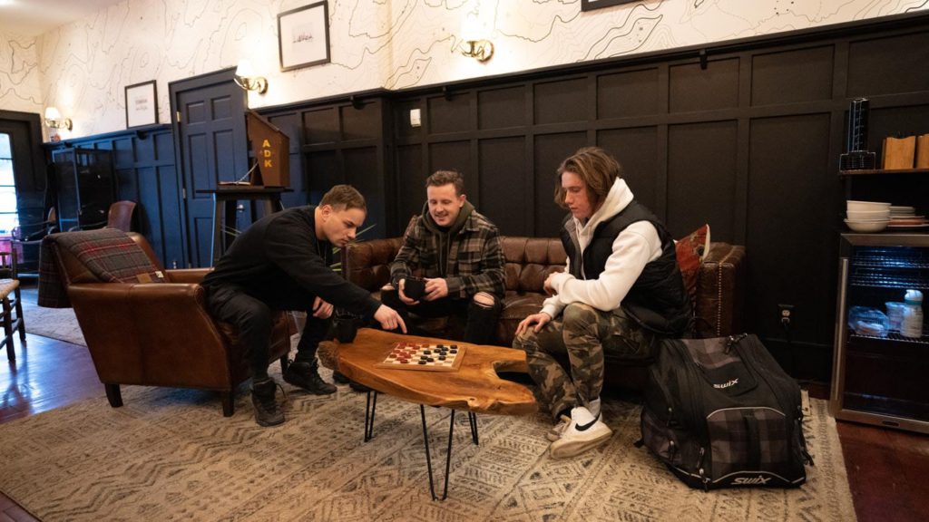 a group of people playing a game of chess