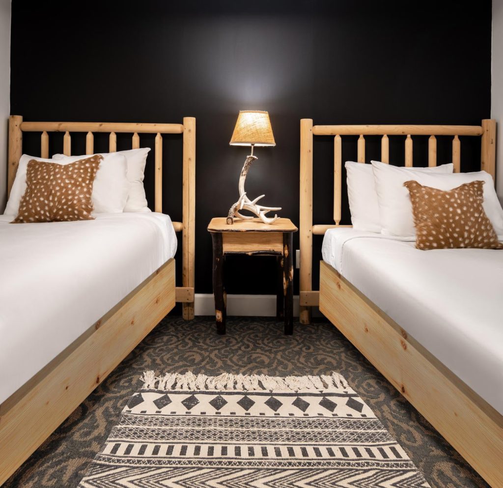 a couple of beds sitting next to each other
